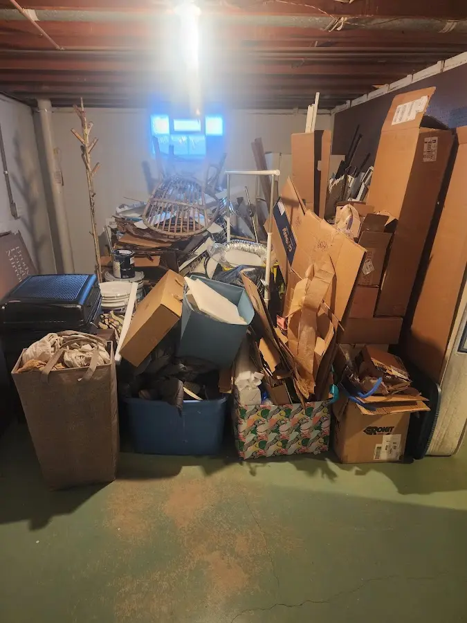 Roll-off dumpster container at job site for 2 Yard Dumpster Rental in Medulla